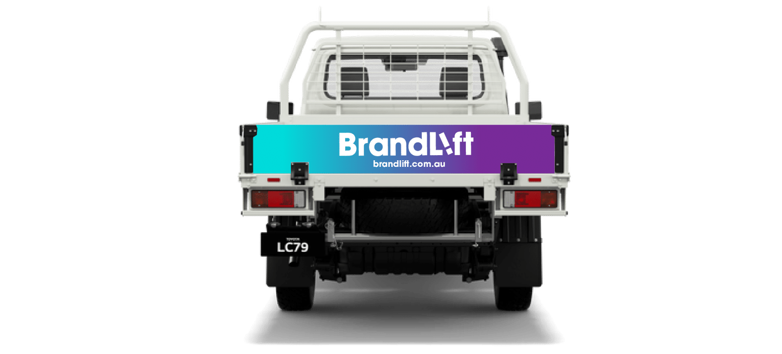 Custom rear tray side signage applied to a ute on the Sunshine Coast