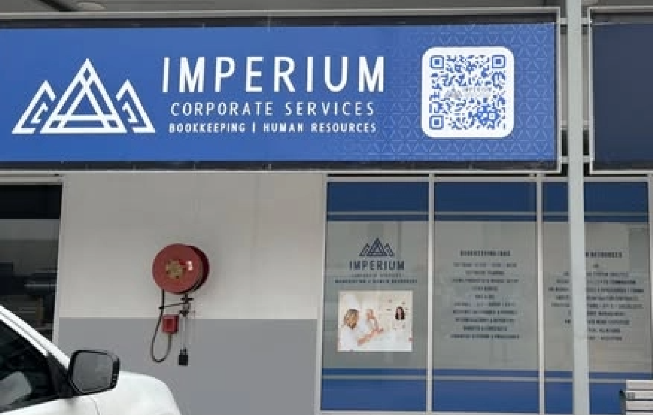Frosted window signage installed at a business in Birtinya on the Sunshine Coast