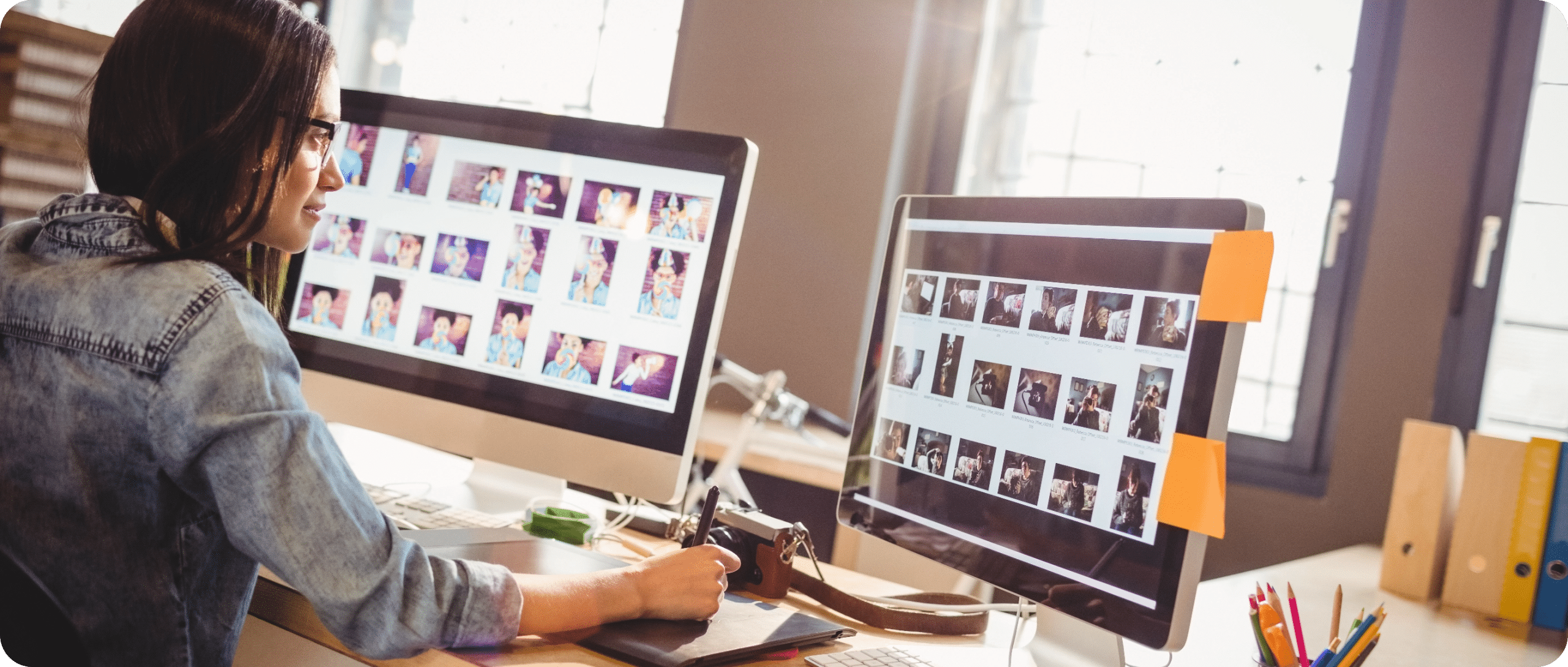Graphic designer working in-house on custom branding and design projects