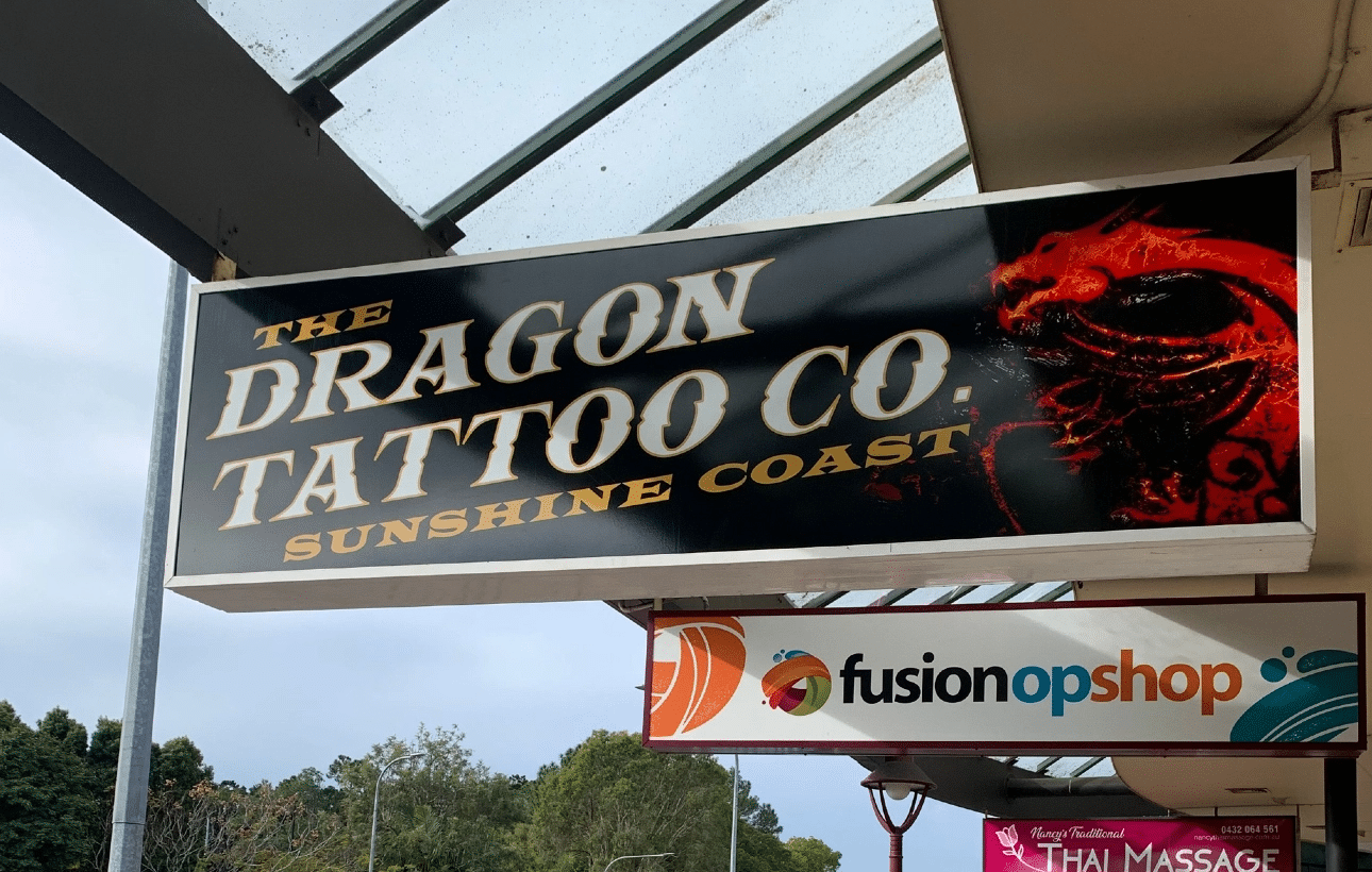Illuminated light box signage on a commercial building in the Sunshine Coast