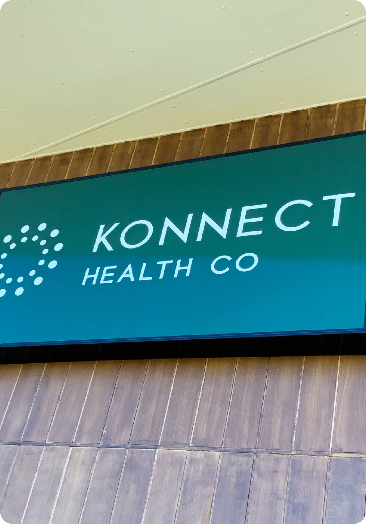 Illuminated light boxes and light-up signage on a building in the Sunshine Coast